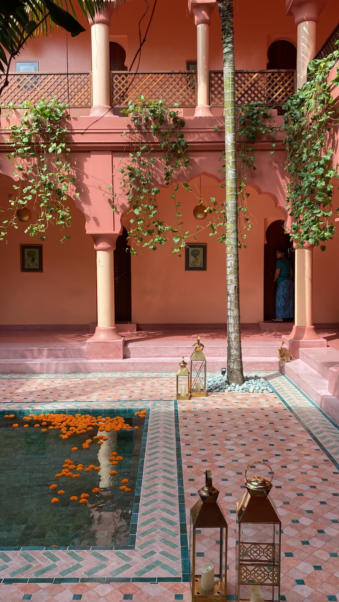 Sunlit arched corridor in a boutique hotel